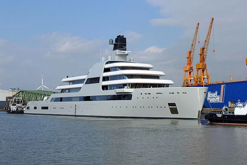 a large white boat with a crane on the side aboard SOLARIS Yacht for Sale