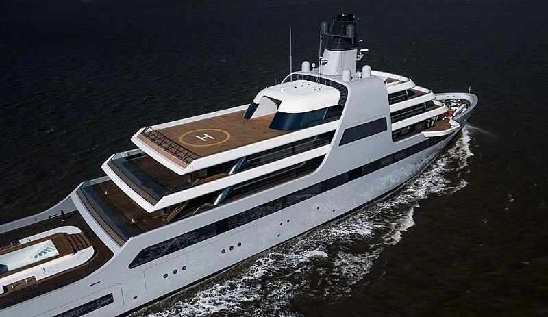 a white boat on a beach aboard SOLARIS Yacht for Sale