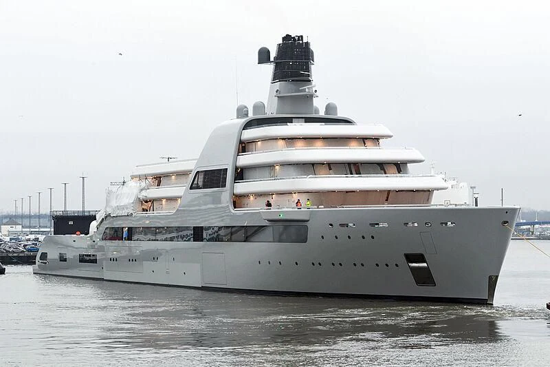 a large white ship aboard SOLARIS Yacht for Sale