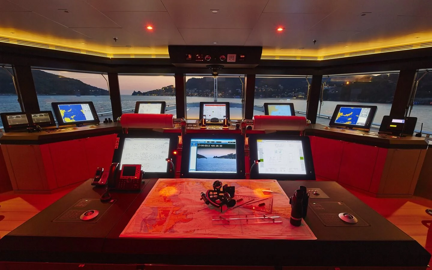 a room with a desk and computer screens aboard STELLA MARIS Yacht for Sale