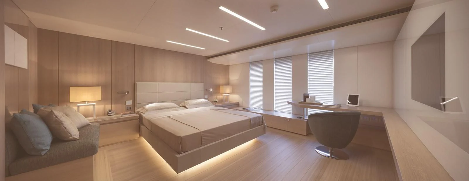 a room with a bed and a couch aboard STELLA MARIS Yacht for Sale