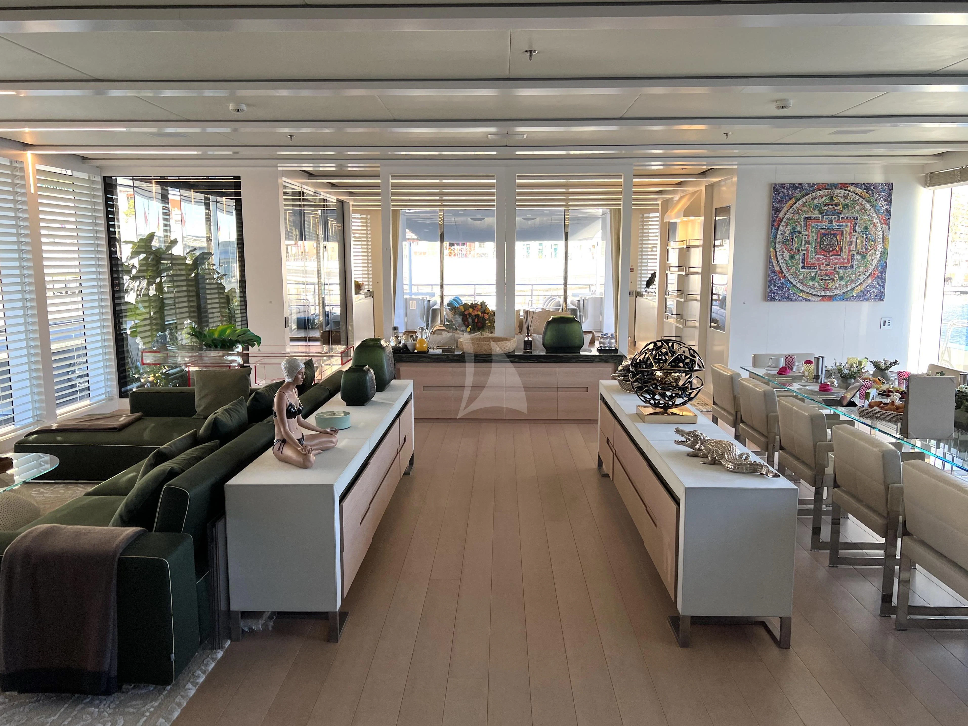 a person sitting in a room aboard STELLA MARIS Yacht for Sale