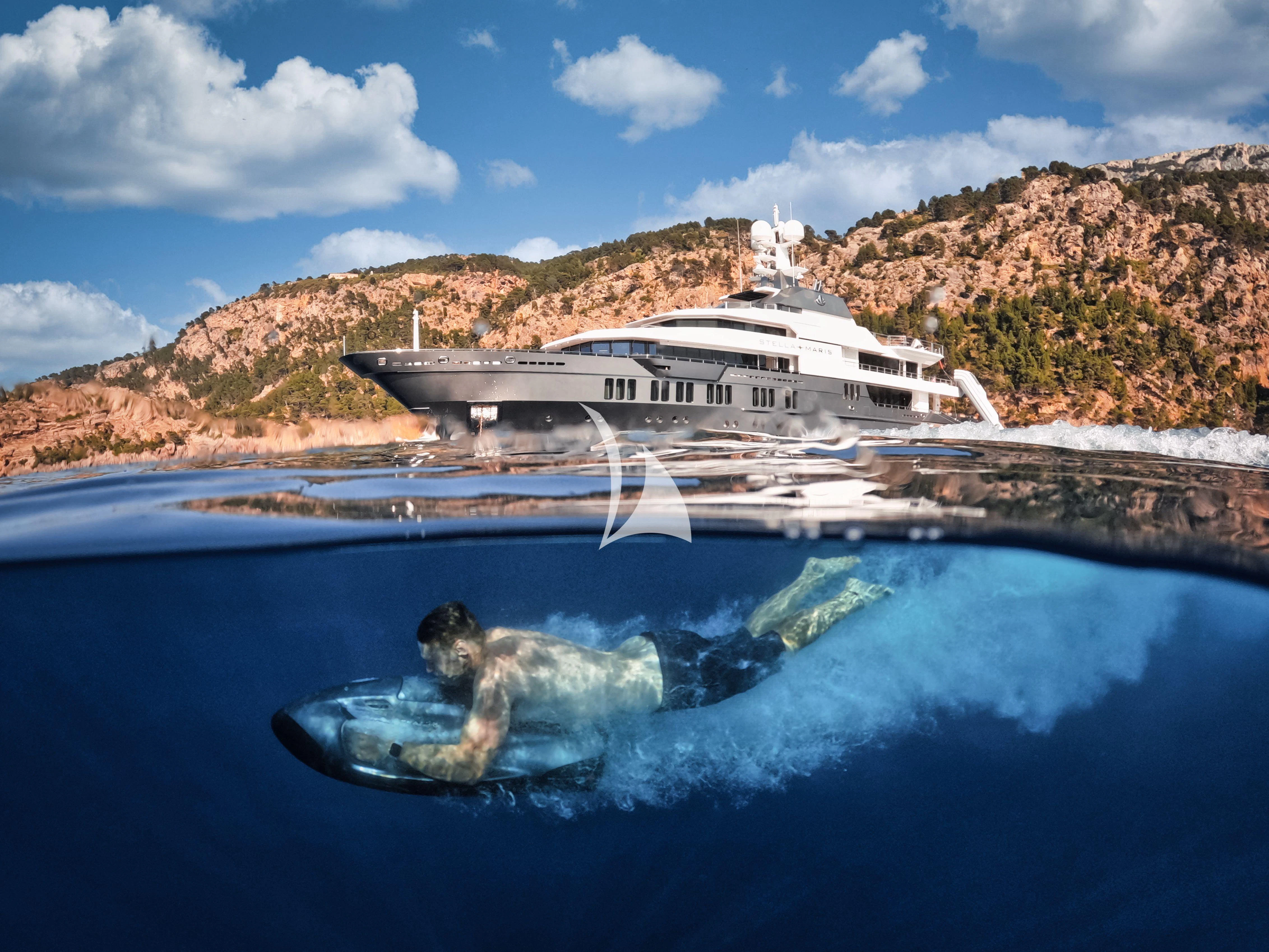 a large white boat in the water aboard STELLA MARIS Yacht for Sale