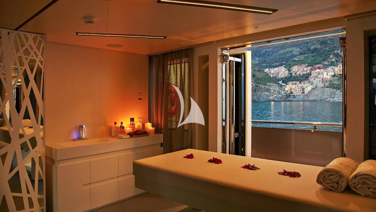 a large bathroom with a large window aboard STELLA MARIS Yacht for Sale