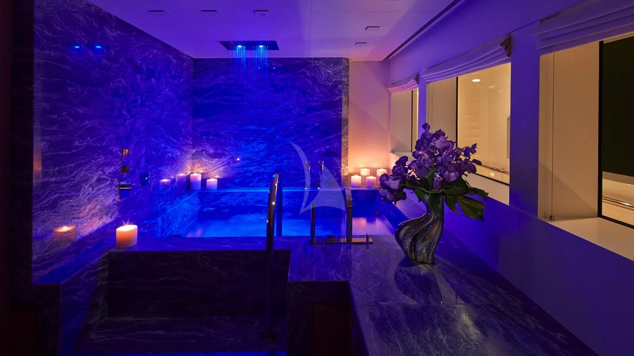 a room with a large wall mural aboard STELLA MARIS Yacht for Sale