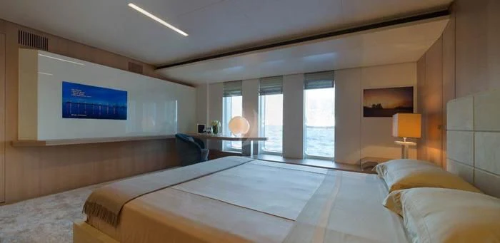 a large bed in a room aboard STELLA MARIS Yacht for Sale
