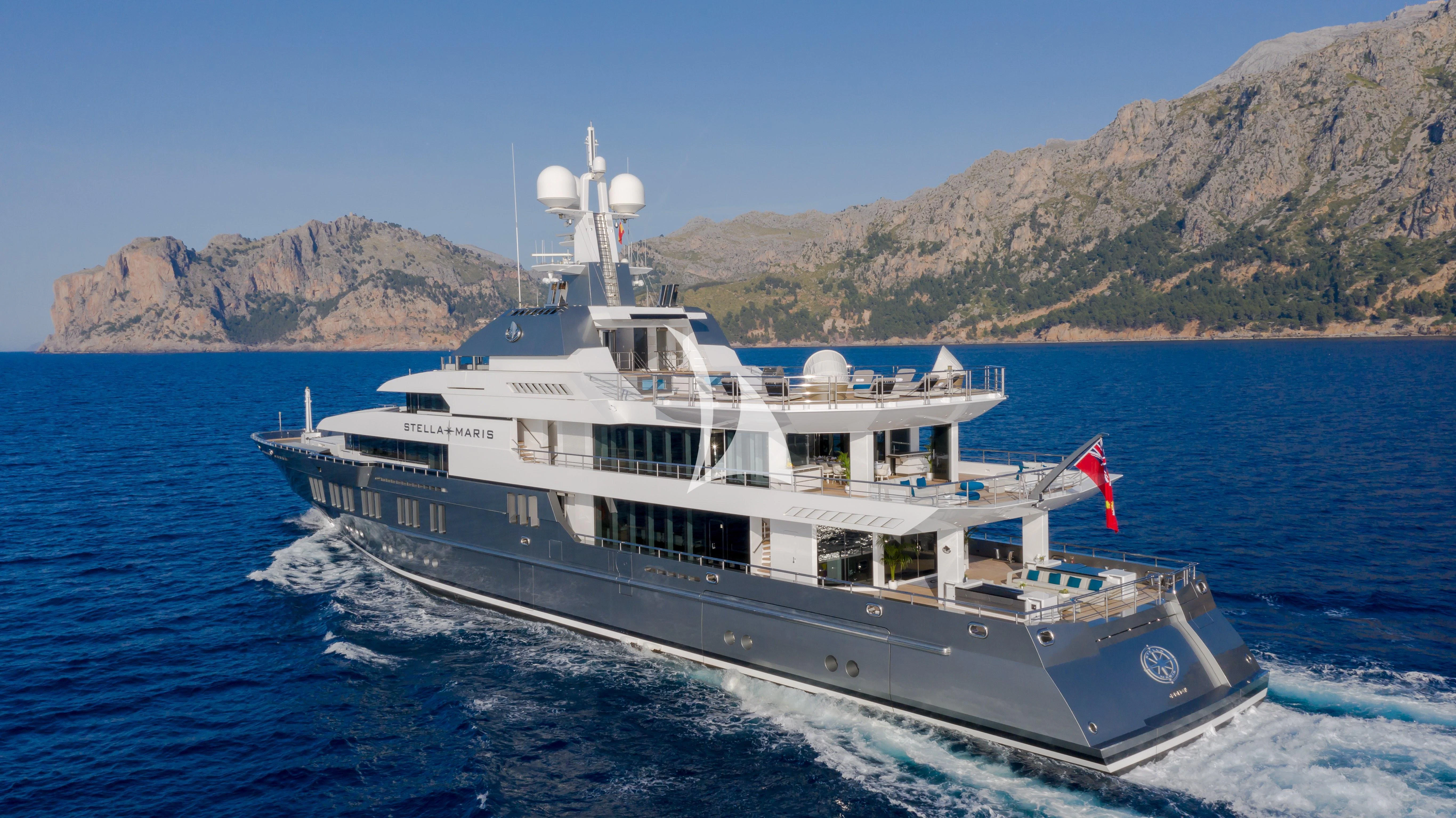 a large white boat on the water aboard STELLA MARIS Yacht for Sale