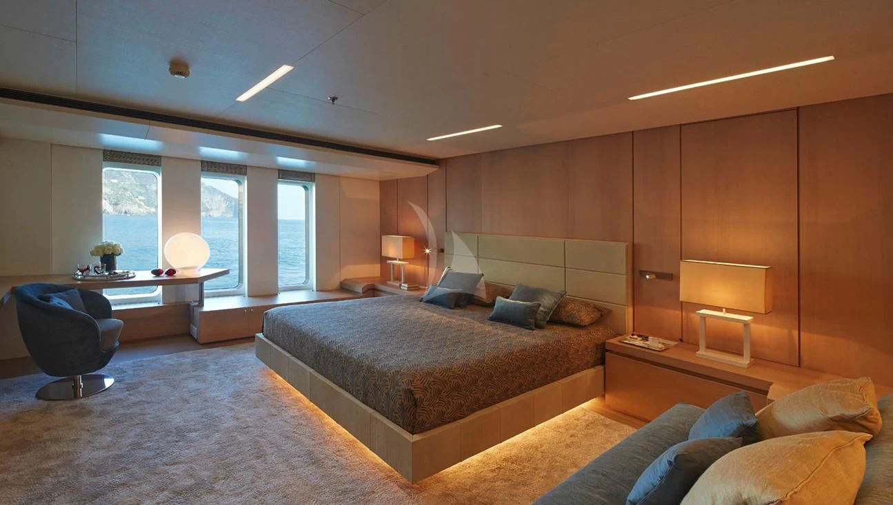 a large bedroom with a large bed aboard STELLA MARIS Yacht for Sale