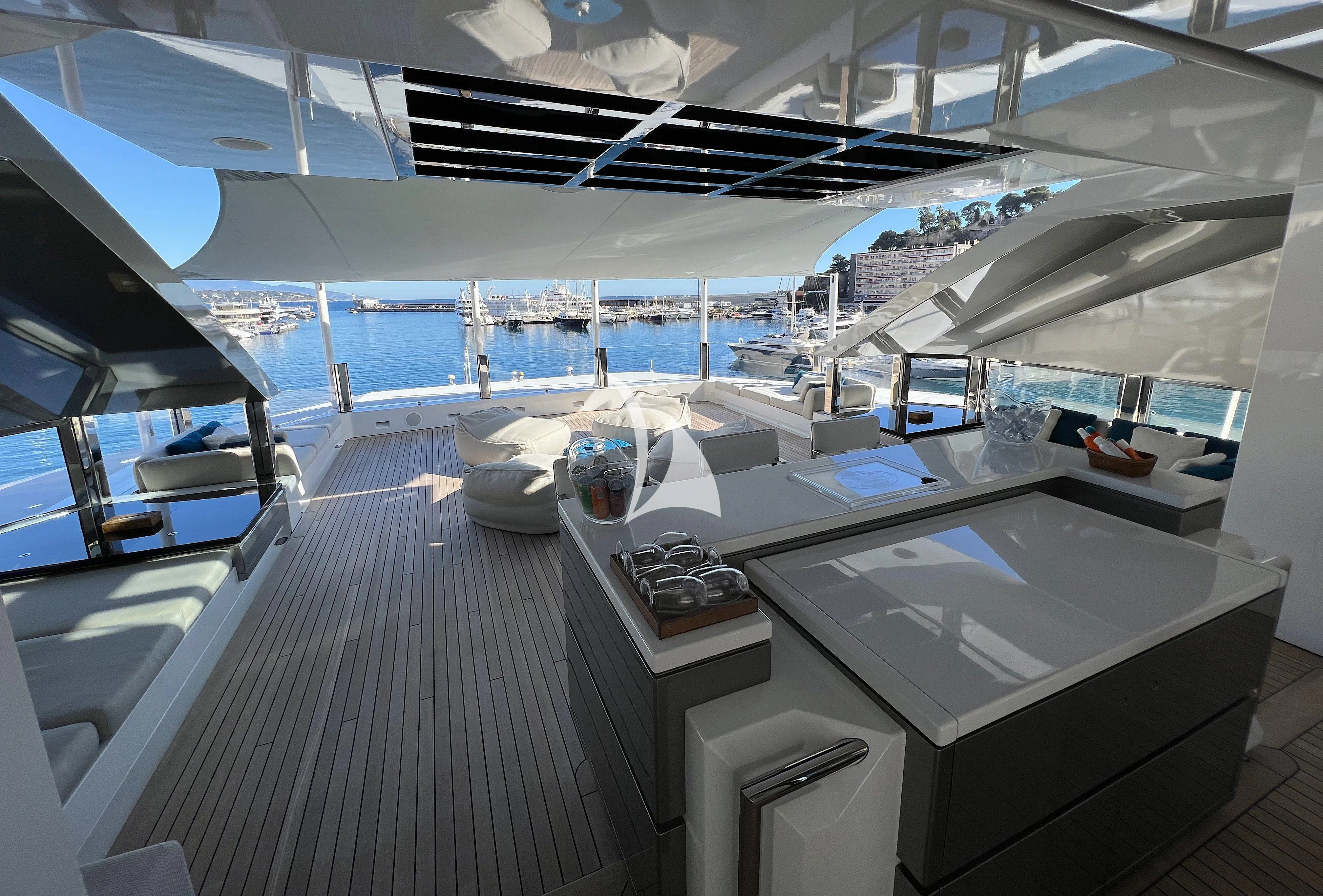 a room with a large window and a view of the water aboard STELLA MARIS Yacht for Sale