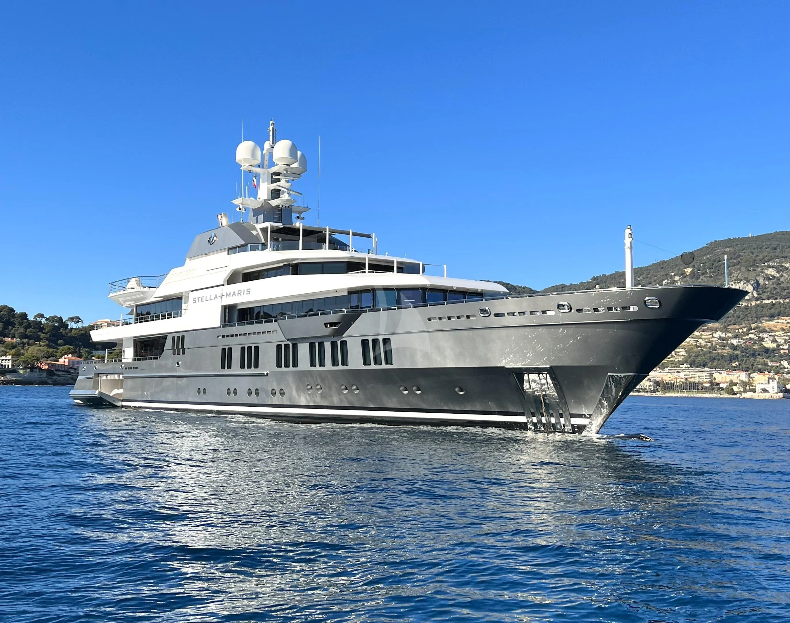 a large white boat in the water aboard STELLA MARIS Yacht for Sale