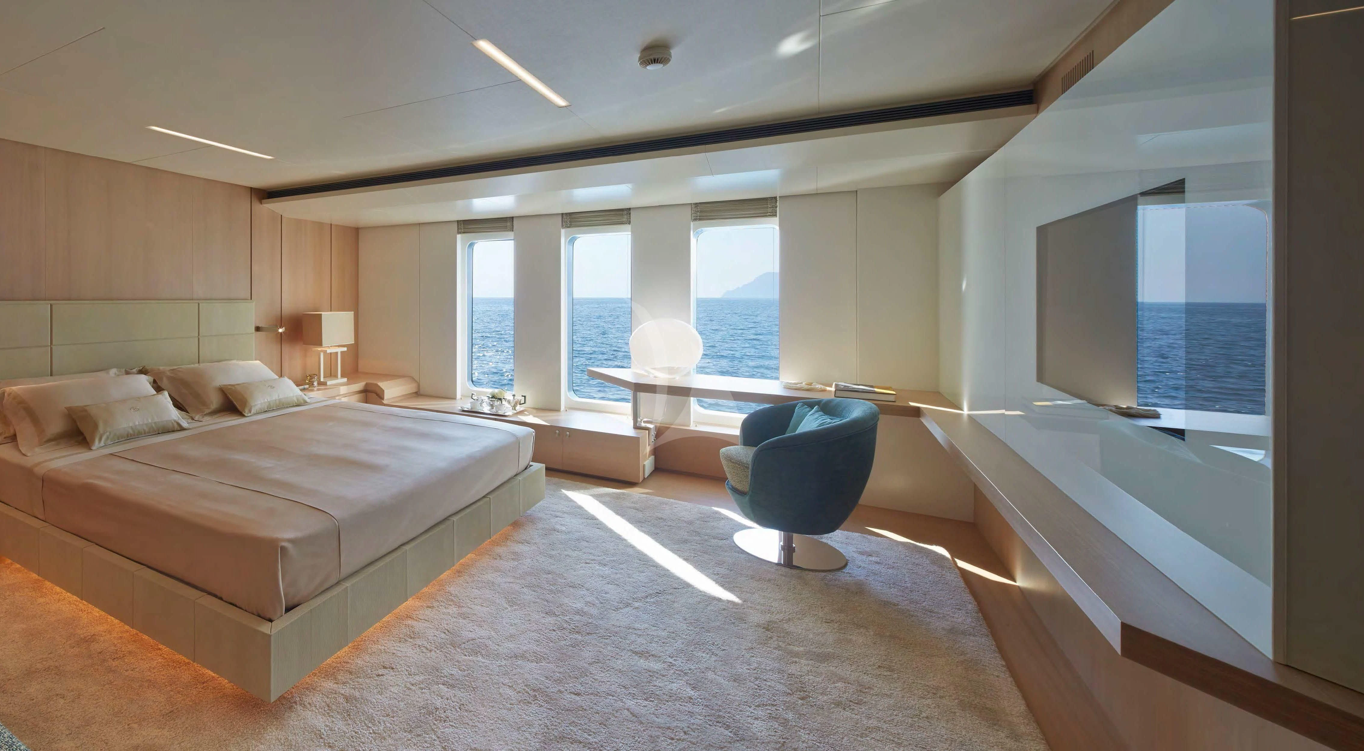 a large bedroom with a large bed aboard STELLA MARIS Yacht for Sale