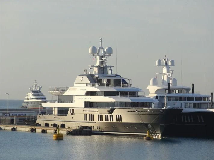 a large ship in the water aboard STELLA MARIS Yacht for Sale