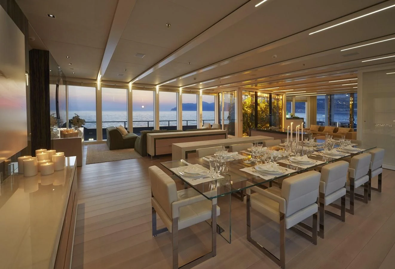 a large dining room with tables and chairs aboard STELLA MARIS Yacht for Sale