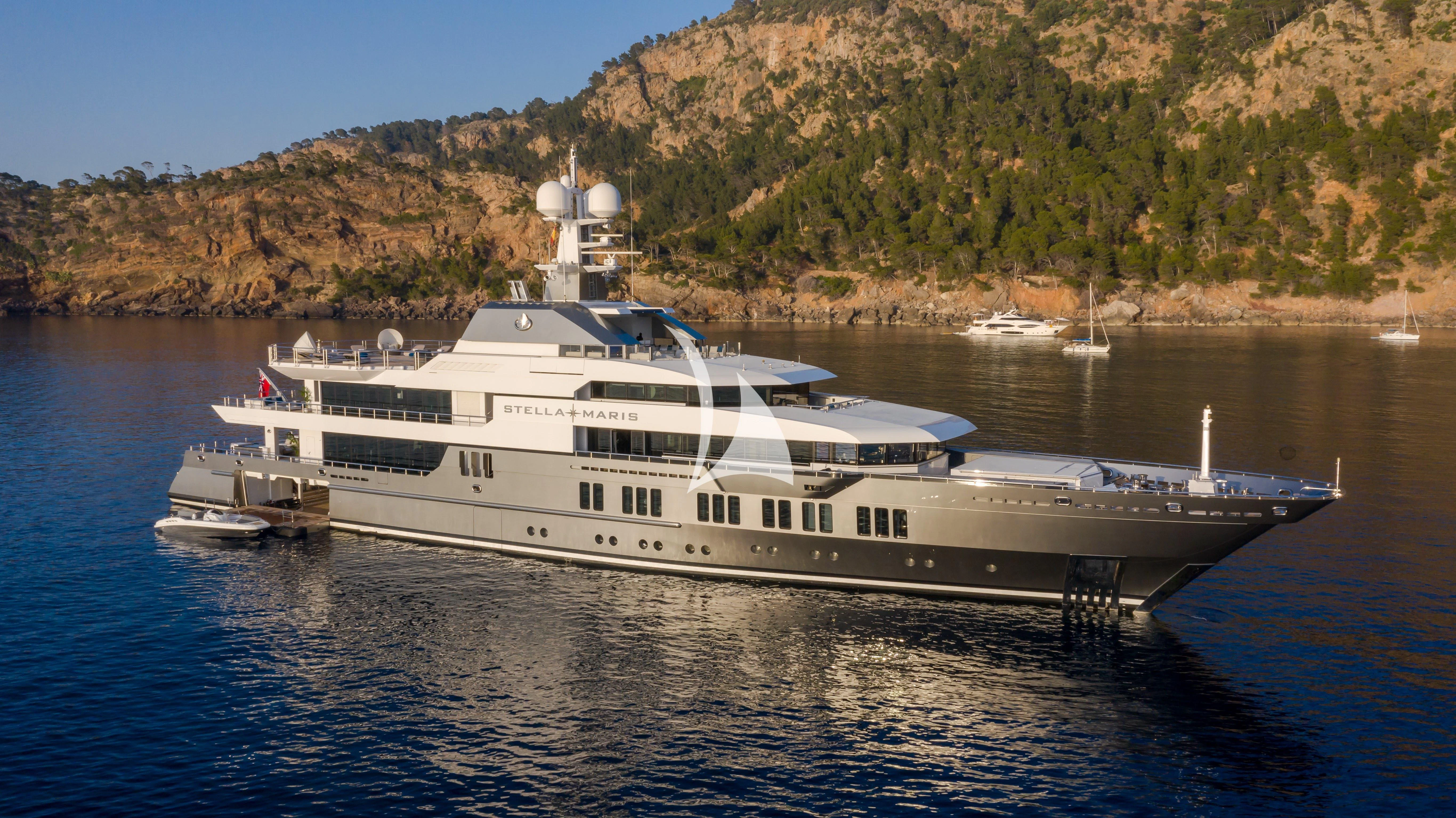a large white yacht on the water aboard STELLA MARIS Yacht for Sale