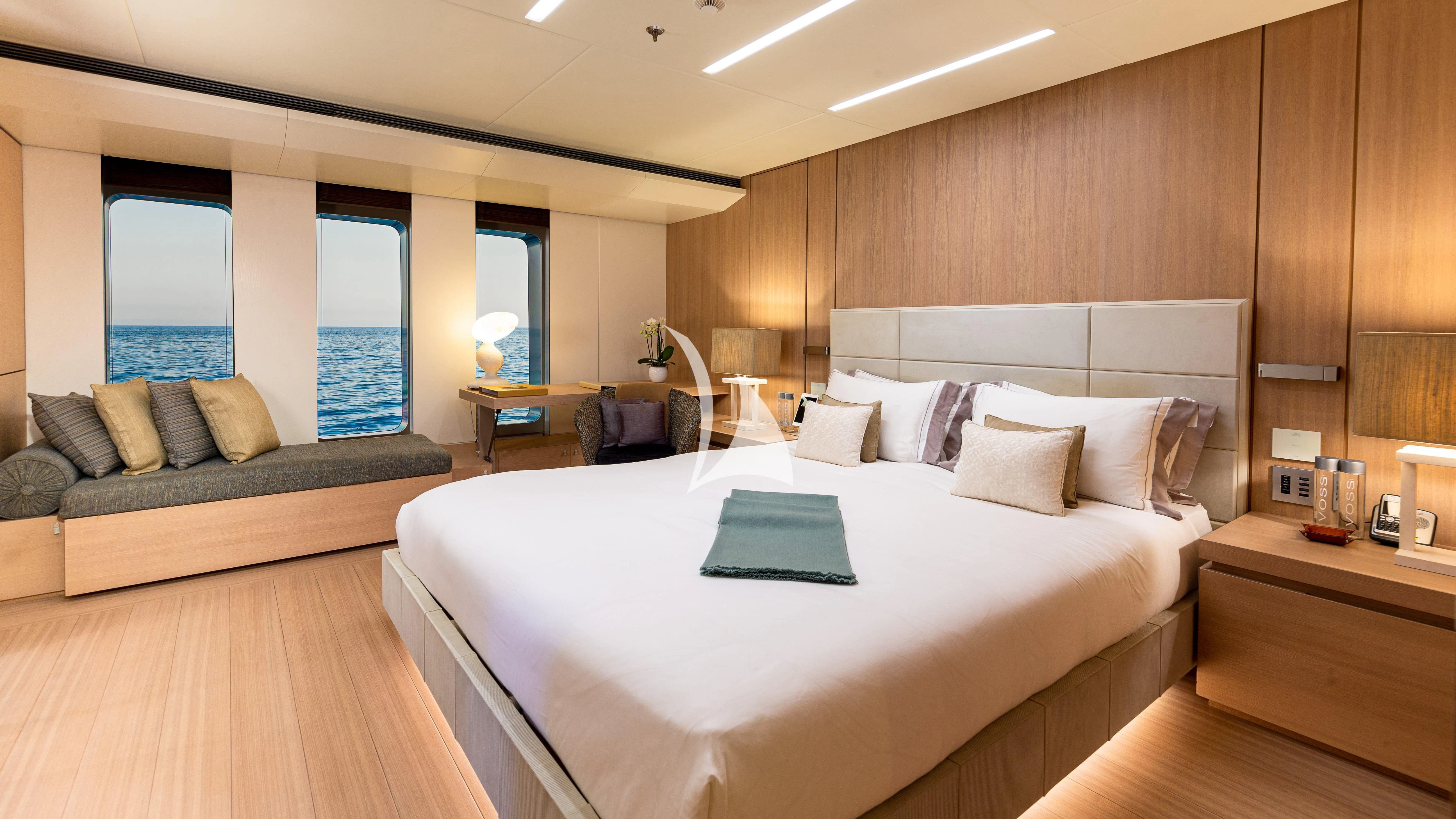 a large bed in a room aboard STELLA MARIS Yacht for Sale