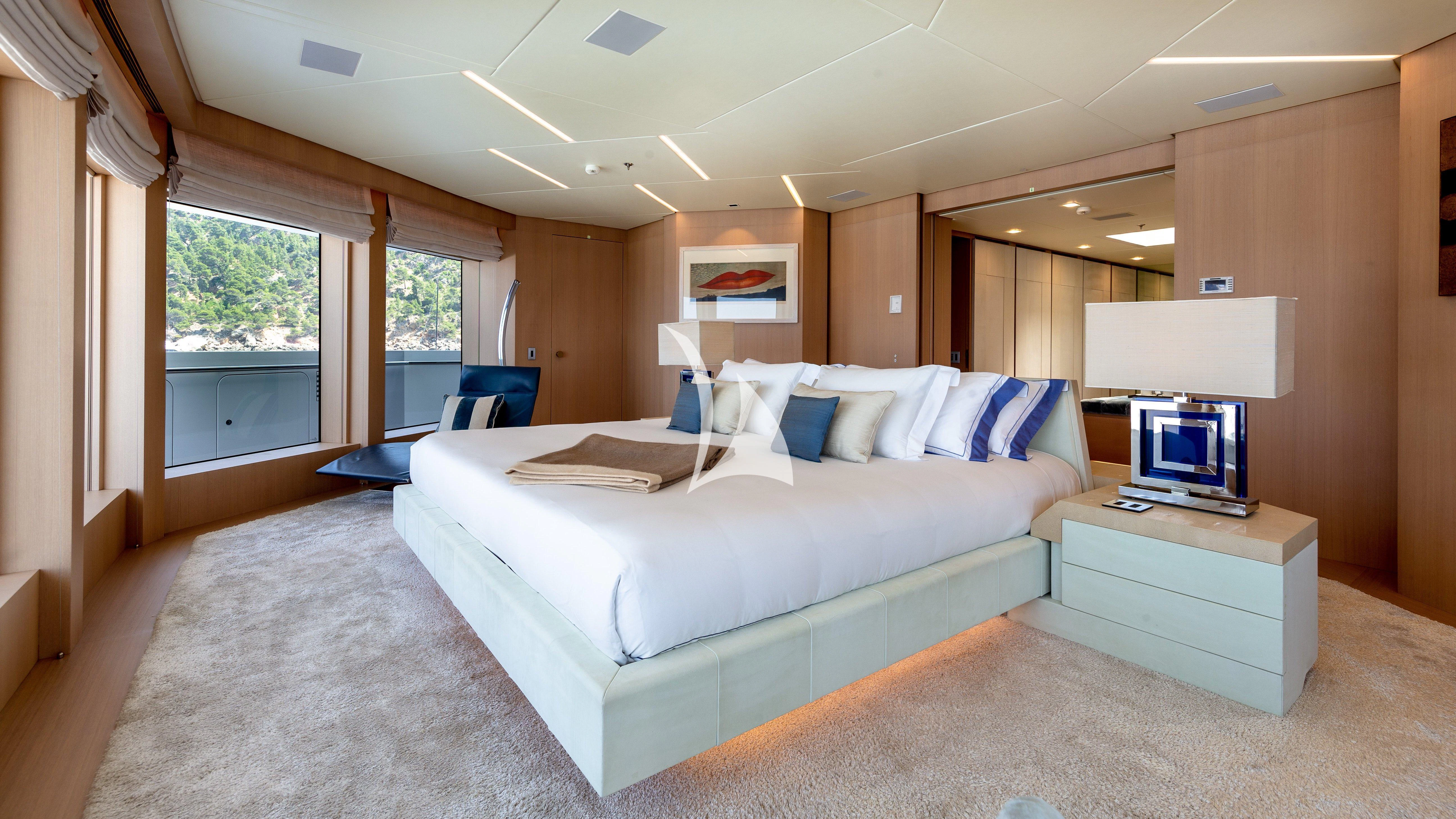 a large bed in a room aboard STELLA MARIS Yacht for Sale
