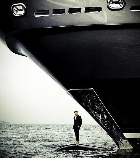 a man standing on a boat aboard STELLA MARIS Yacht for Sale