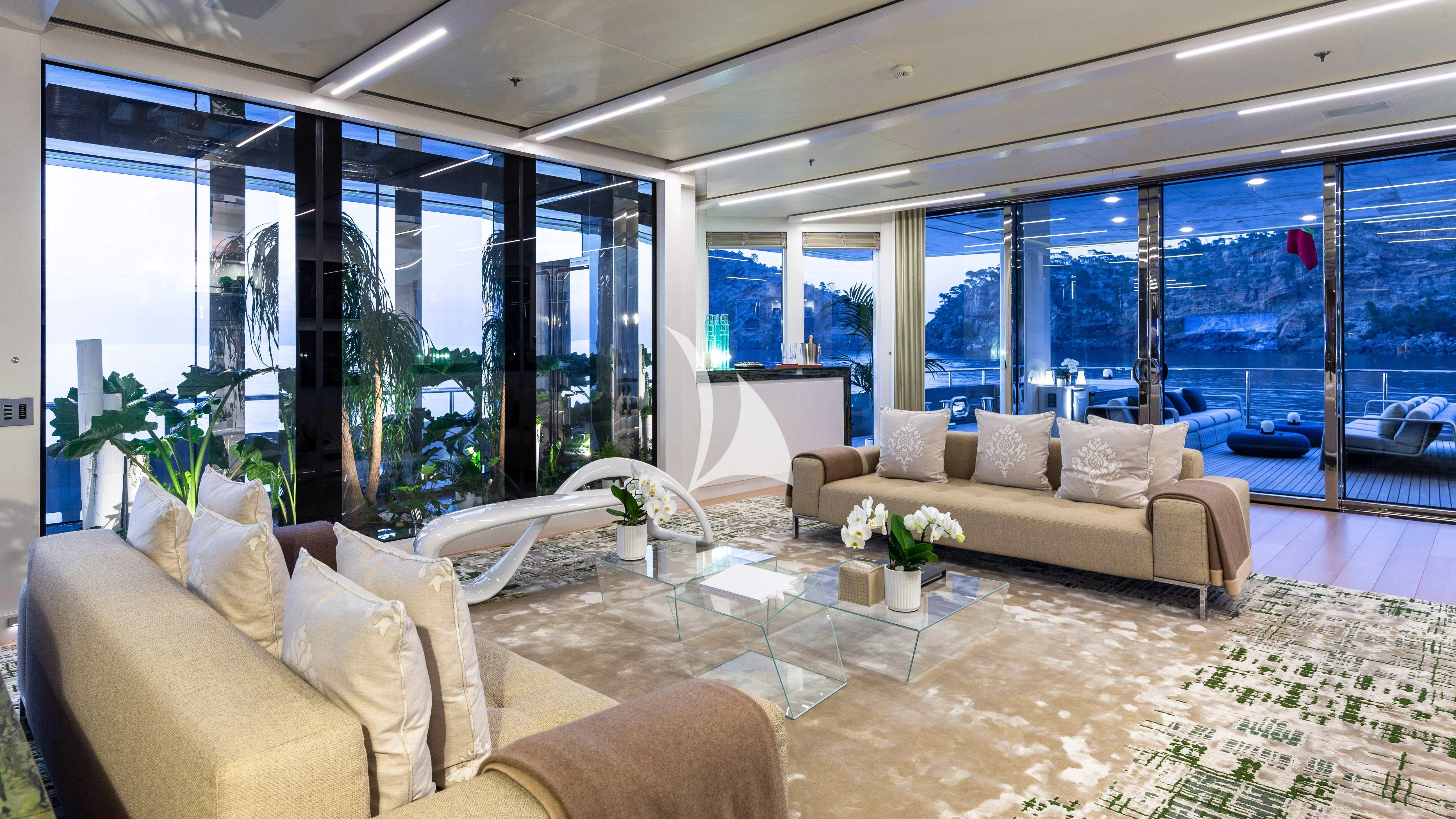 a living room with a large window aboard STELLA MARIS Yacht for Sale