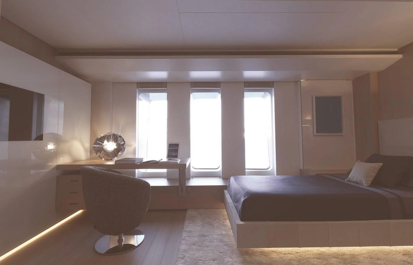 a room with a bed and a desk aboard STELLA MARIS Yacht for Sale