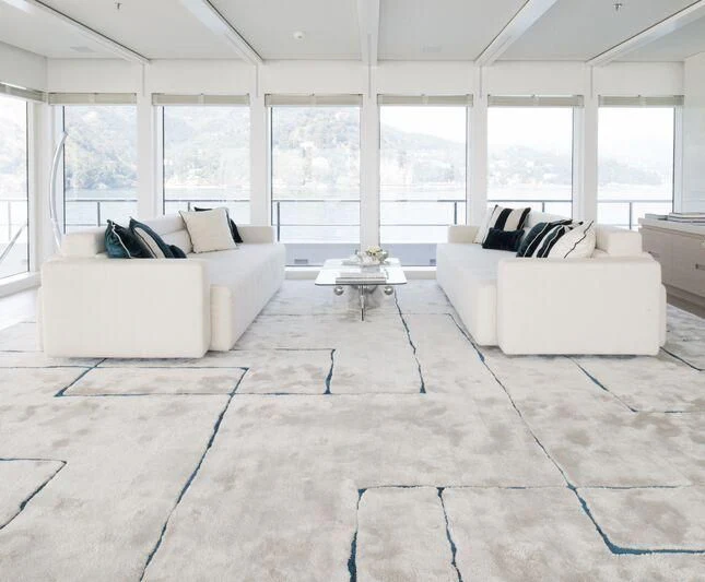 a room with white furniture aboard STELLA MARIS Yacht for Sale