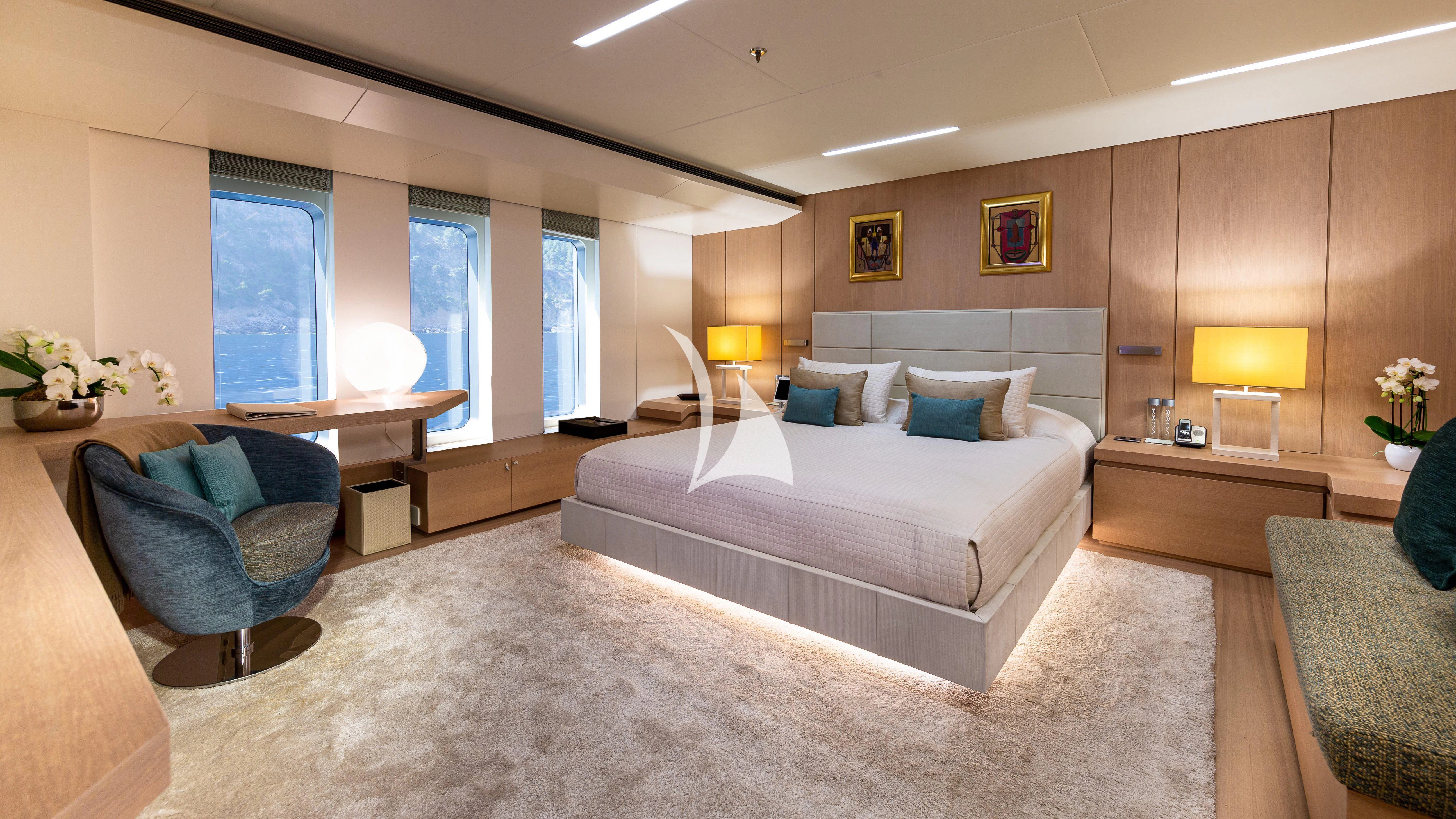 a large bedroom with a large bed aboard STELLA MARIS Yacht for Sale