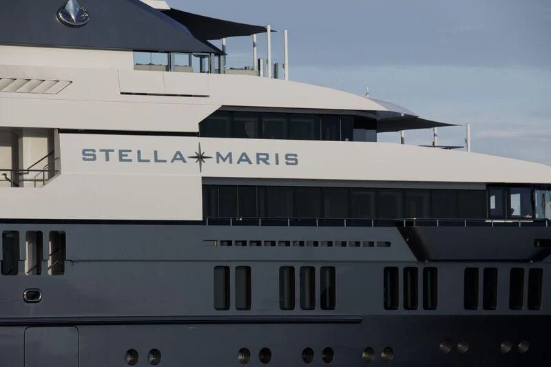 a white building with a sign on it aboard STELLA MARIS Yacht for Sale