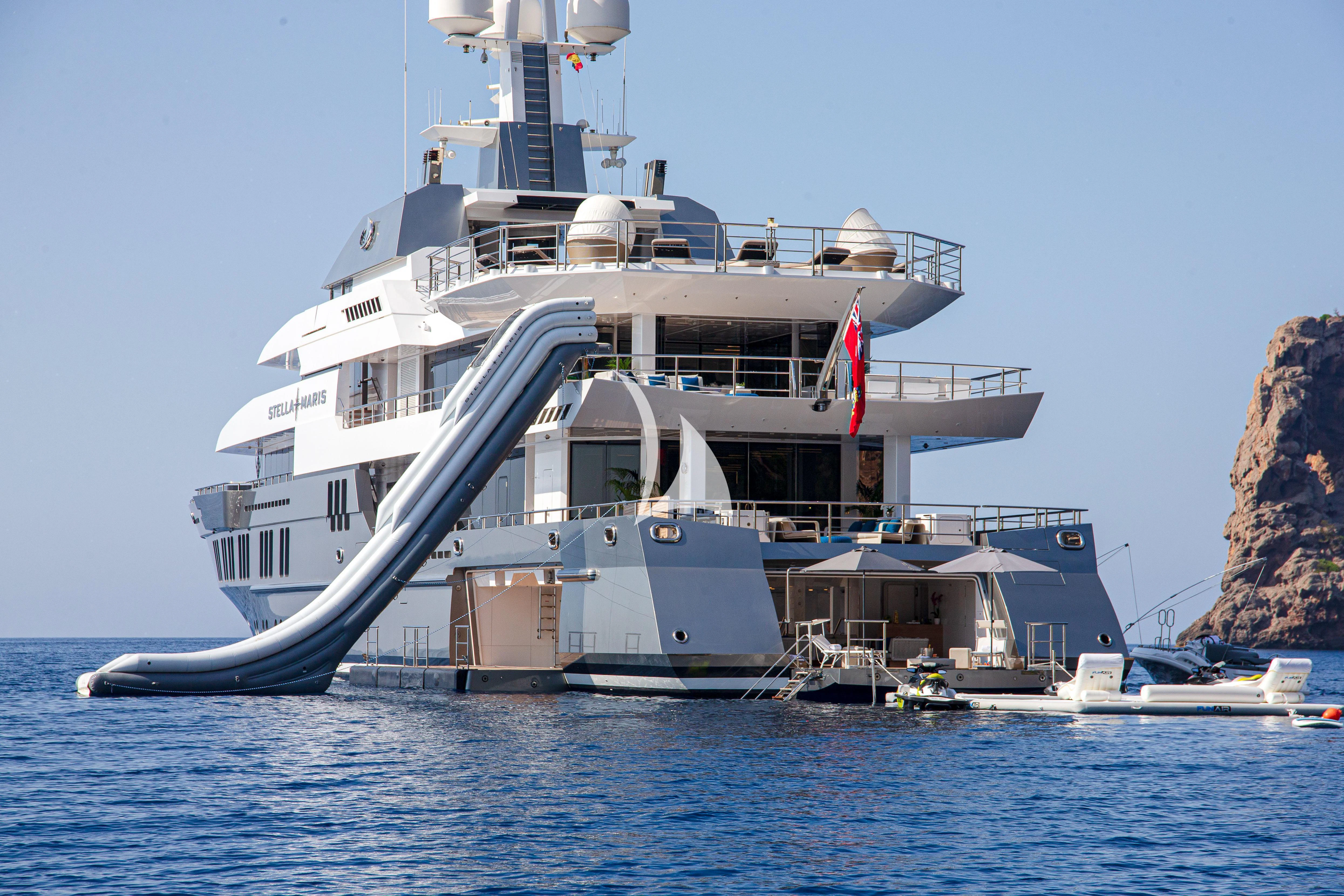 a large white ship in the water aboard STELLA MARIS Yacht for Sale