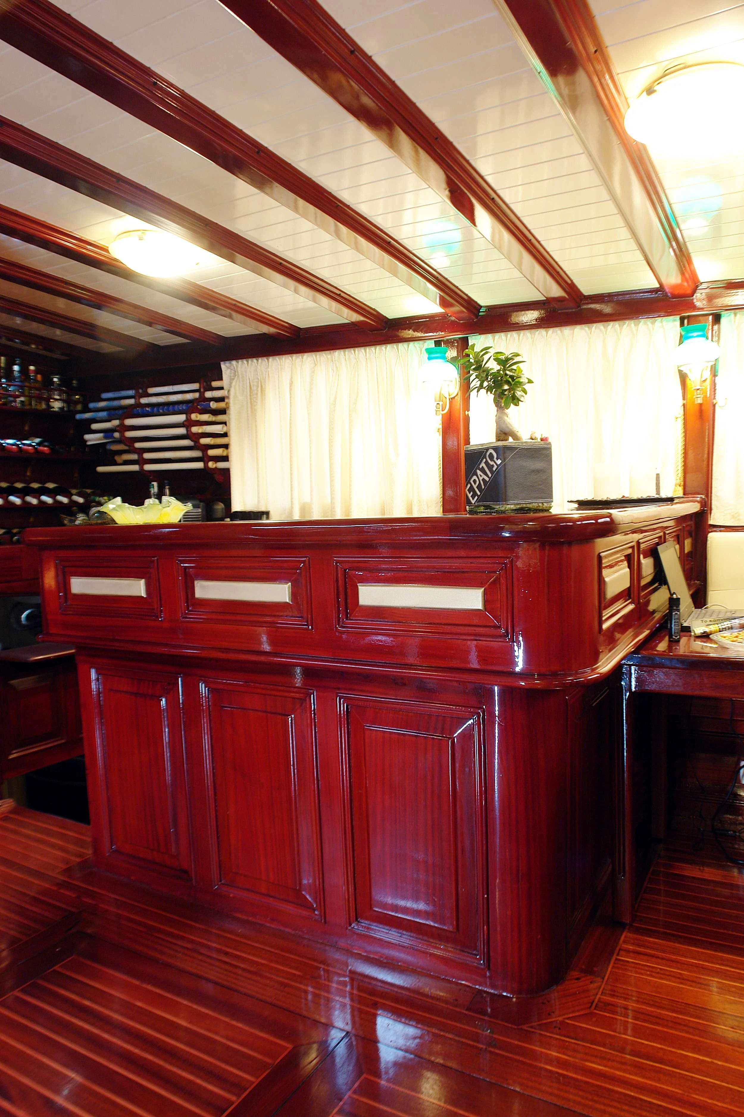 a room with a desk and a computer aboard ERATO Yacht for Charter