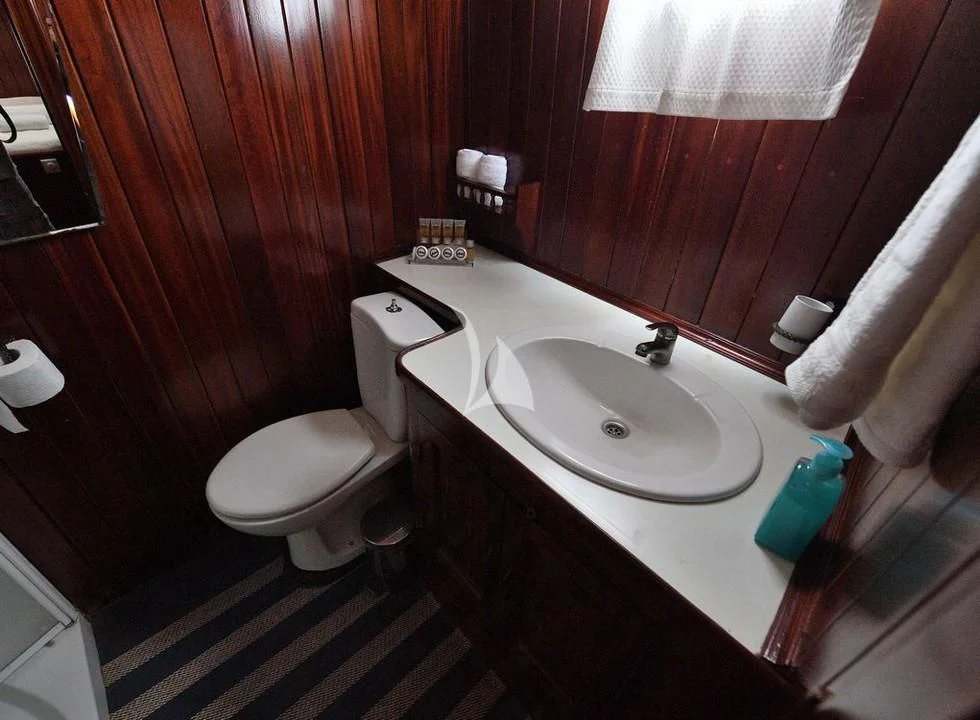 a bathroom with a sink and toilet aboard ERATO Yacht for Charter