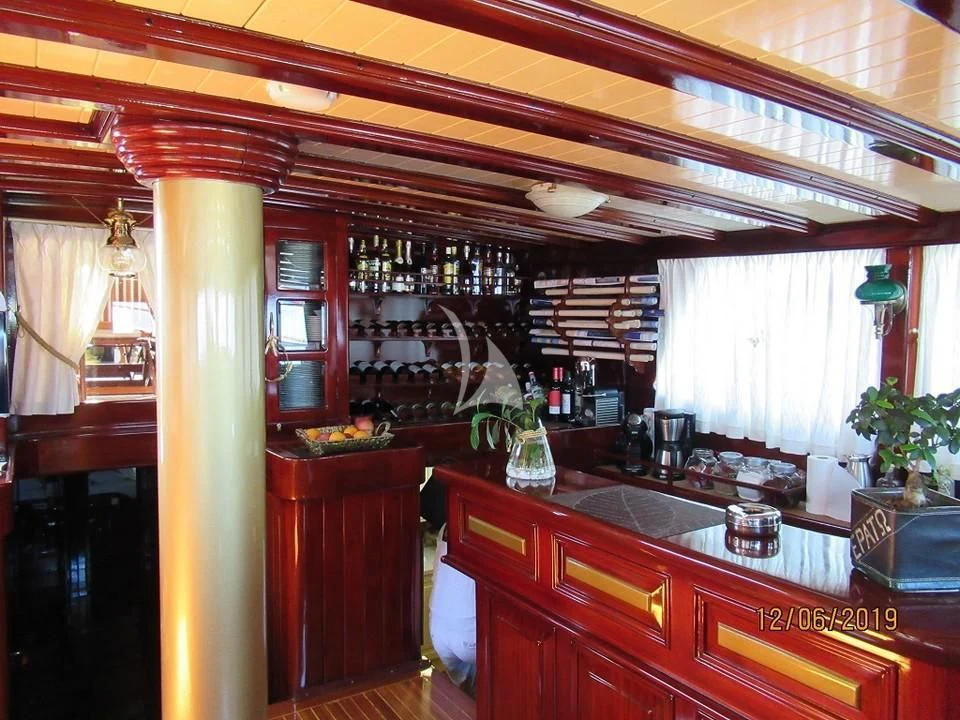 a kitchen with a bar and a bar aboard ERATO Yacht for Charter