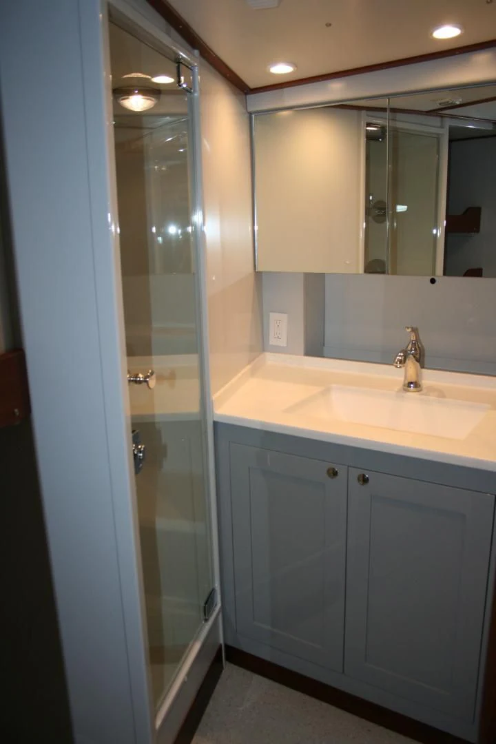 a bathroom with a glass shower aboard SINDBAD Yacht for Sale