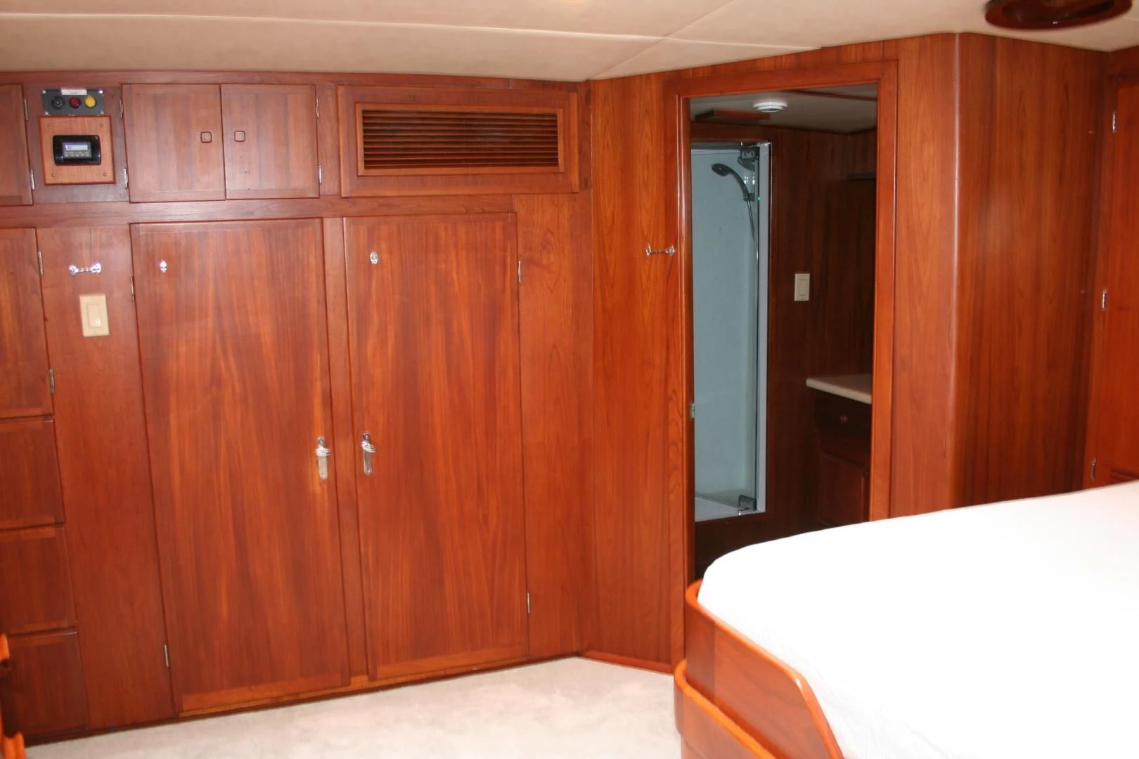 a room with wooden cabinets aboard SINDBAD Yacht for Sale