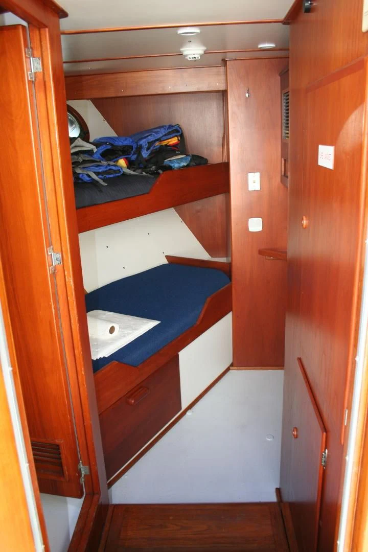 a room with a closet and a bed aboard SINDBAD Yacht for Sale