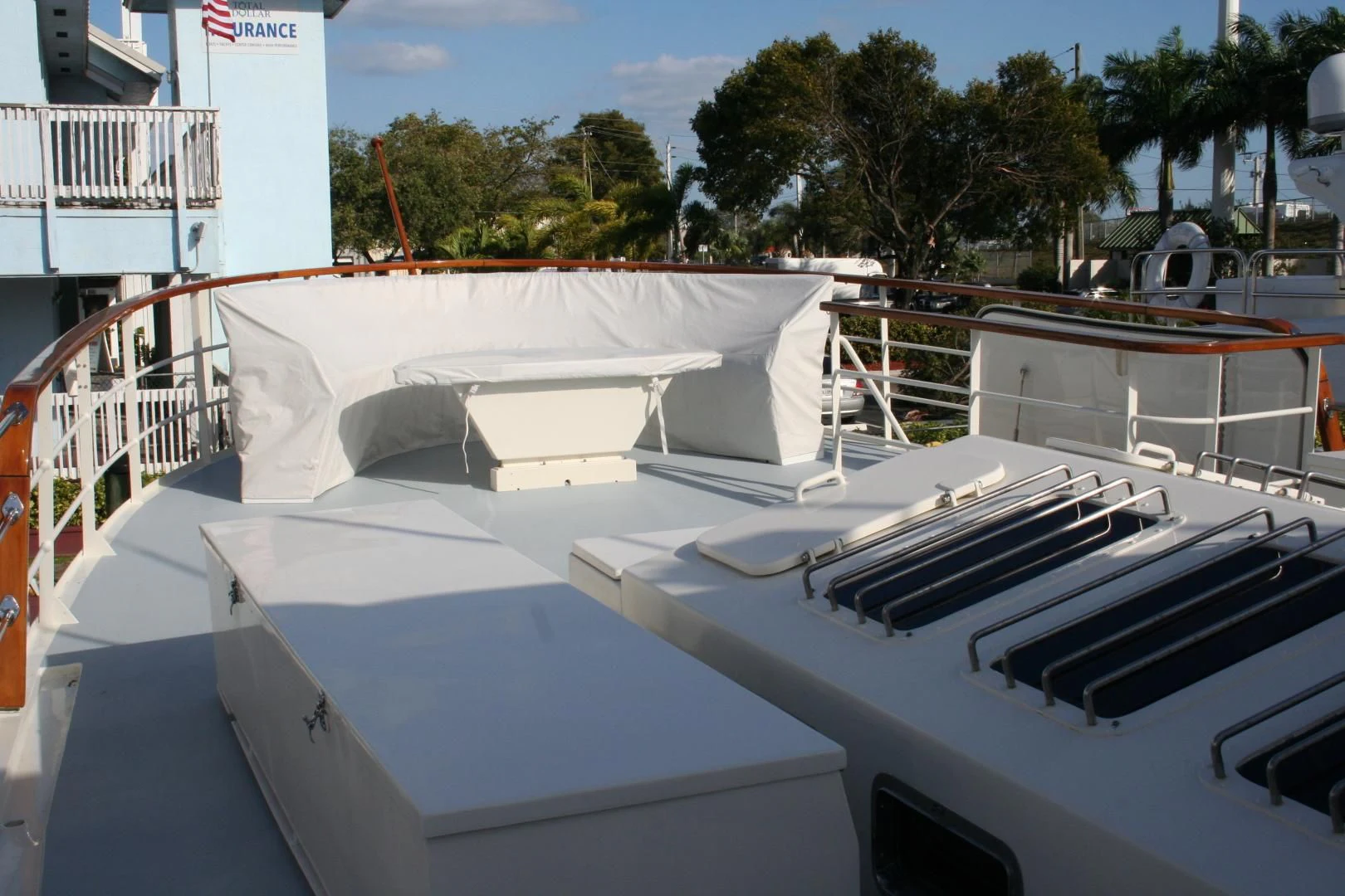 a white boat with a white canopy aboard SINDBAD Yacht for Sale