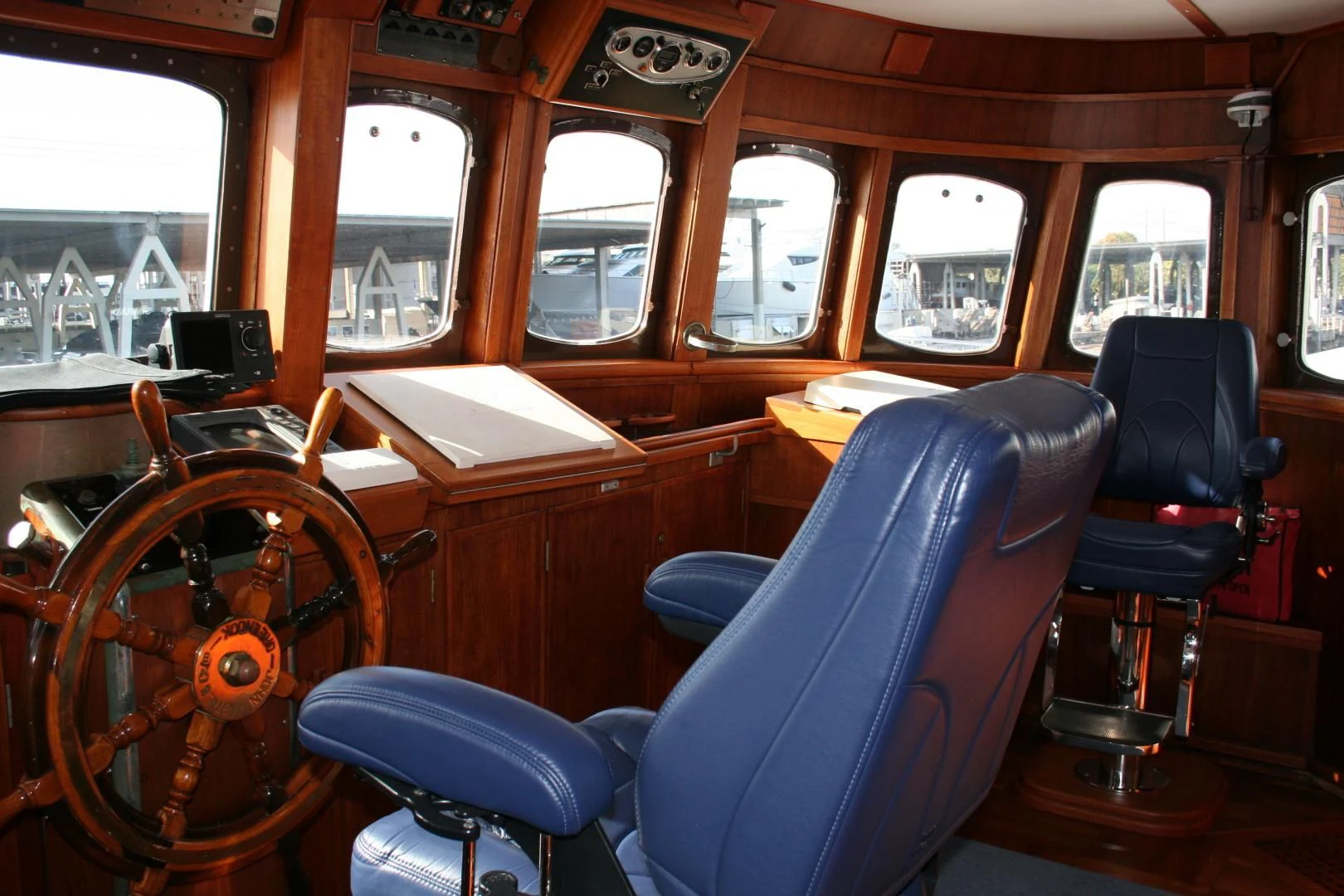 a train with seats and tables aboard SINDBAD Yacht for Sale