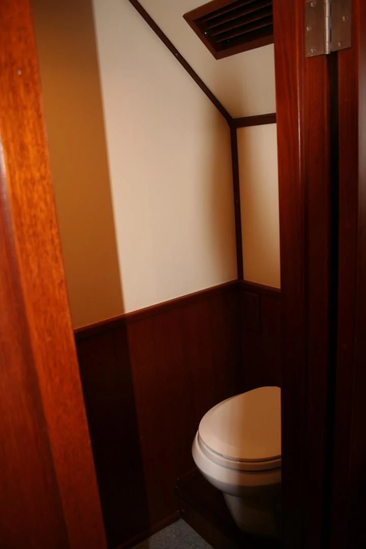 a toilet in a bathroom aboard SINDBAD Yacht for Sale