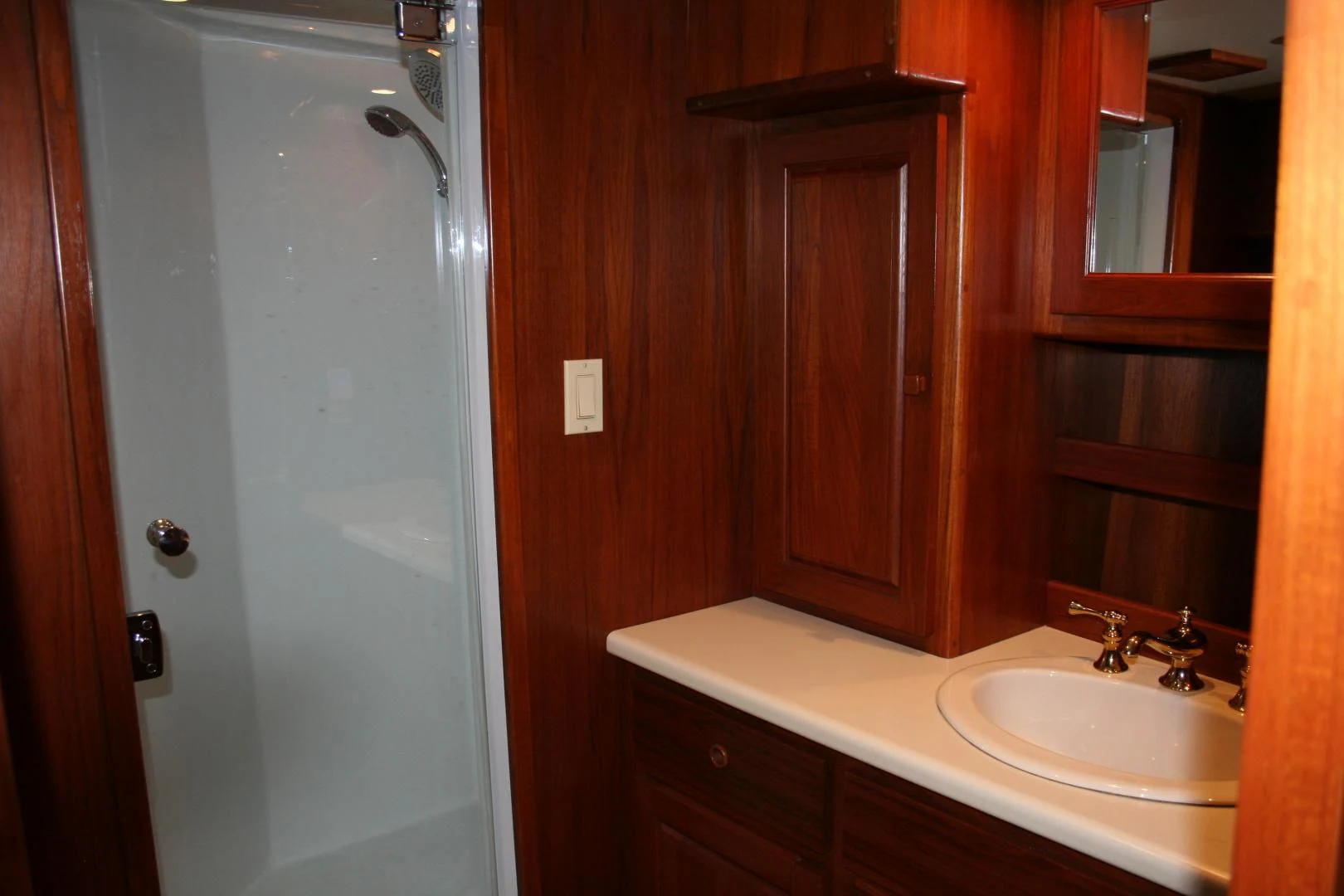 a bathroom with a sink and a shower aboard SINDBAD Yacht for Sale