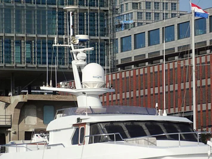 a boat in a harbor aboard SUAKIN Yacht for Sale