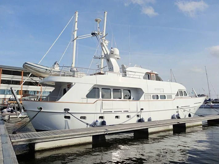 a large white boat aboard SUAKIN Yacht for Sale