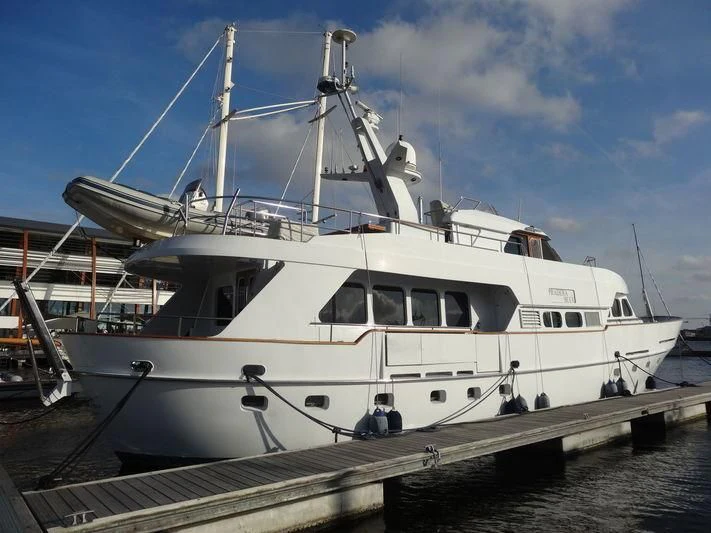 a large white boat aboard SUAKIN Yacht for Sale