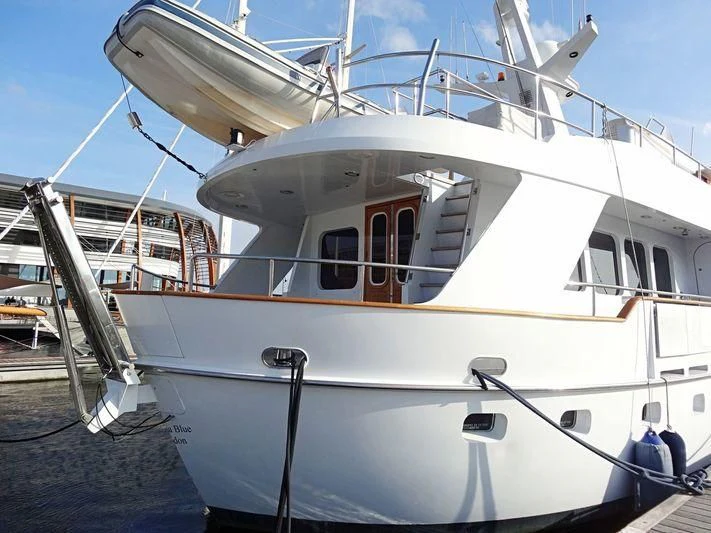 a white boat on the water aboard SUAKIN Yacht for Sale