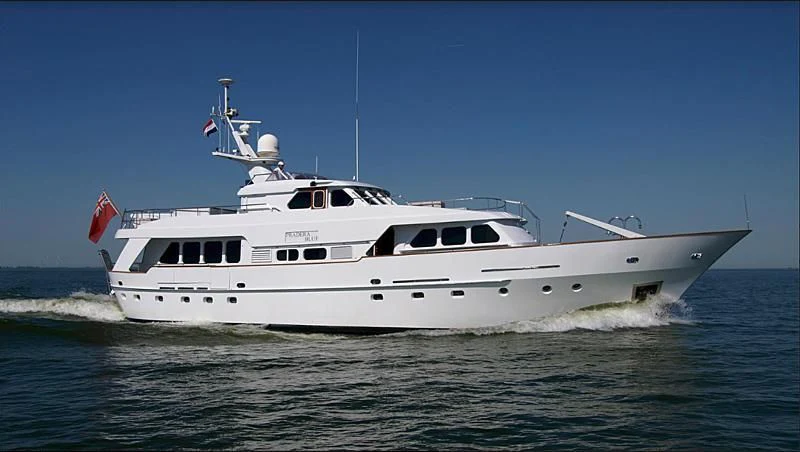 a large white boat in the water aboard SUAKIN Yacht for Sale