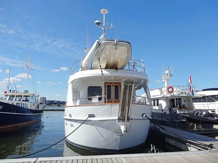 a boat docked at a pier aboard SUAKIN Yacht for Sale