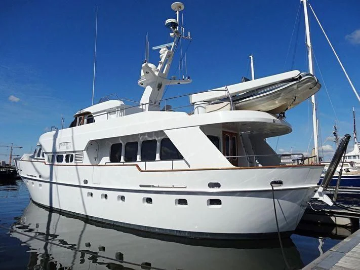 a white yacht in the water aboard SUAKIN Yacht for Sale