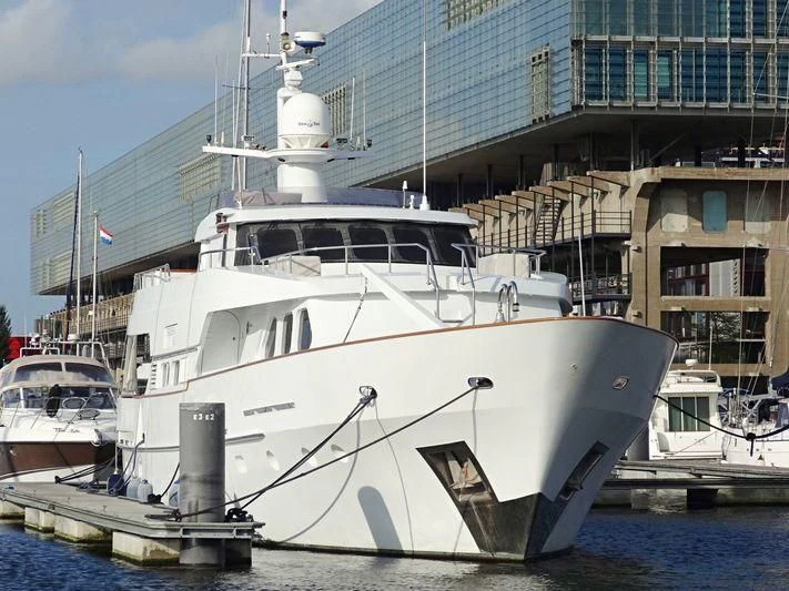 a boat docked in the water aboard SUAKIN Yacht for Sale