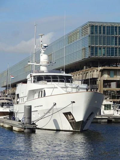 a large white boat in the water aboard SUAKIN Yacht for Sale