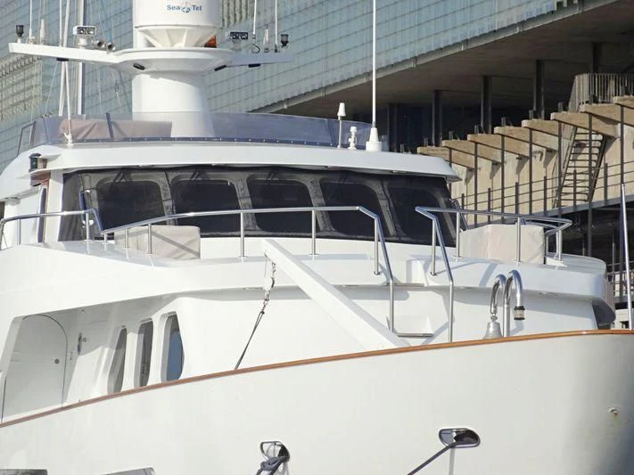 a white boat with a white deck aboard SUAKIN Yacht for Sale