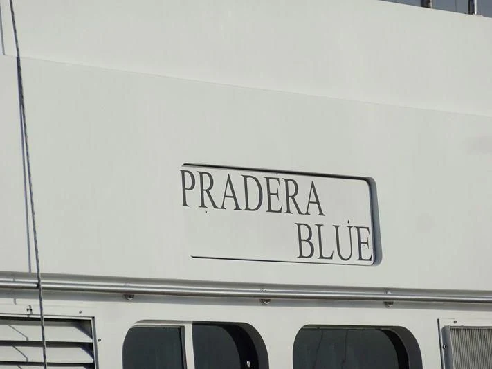 a white car with a sign on it aboard SUAKIN Yacht for Sale