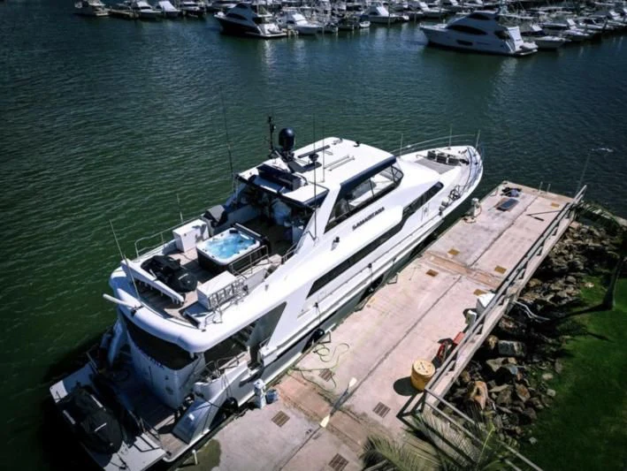 a ship docked at a pier aboard SAMARITANA Yacht for Sale