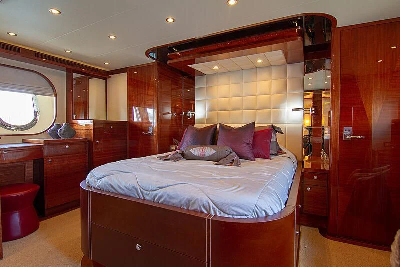 a bed in a room aboard SAMARITANA Yacht for Sale